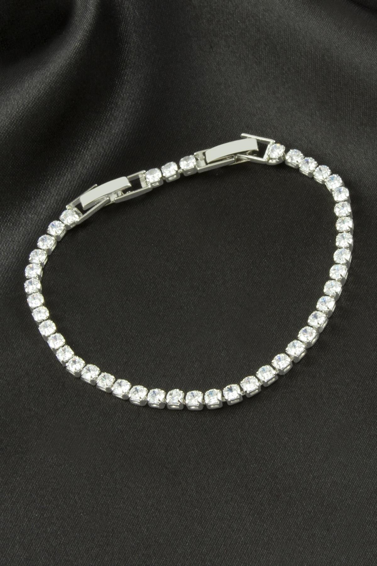 1204554_Yuvarlak-Zirkon-Tasli-Luks-Kararmaz-Bile-652c.jpg Yuvarlak Zirkon Taşlı Lüks Kararmaz Bileklik 3 mm-Gümüş Rengi - Görsel 1