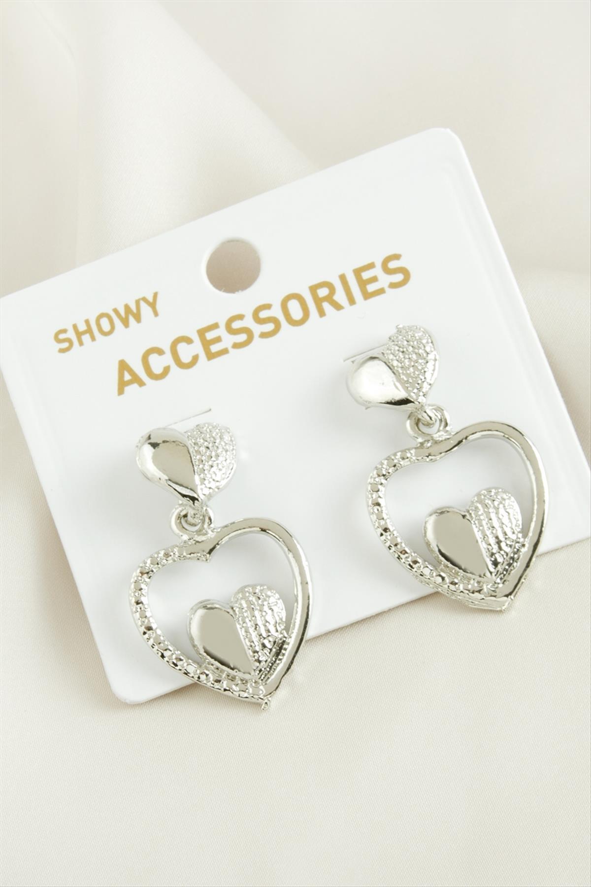 1204850_Yarim-Halka-Trend-Metal-Kupe-f319.jpg Yarım Halka Trend Metal Küpe-Gümüş Rengi - Görsel 1