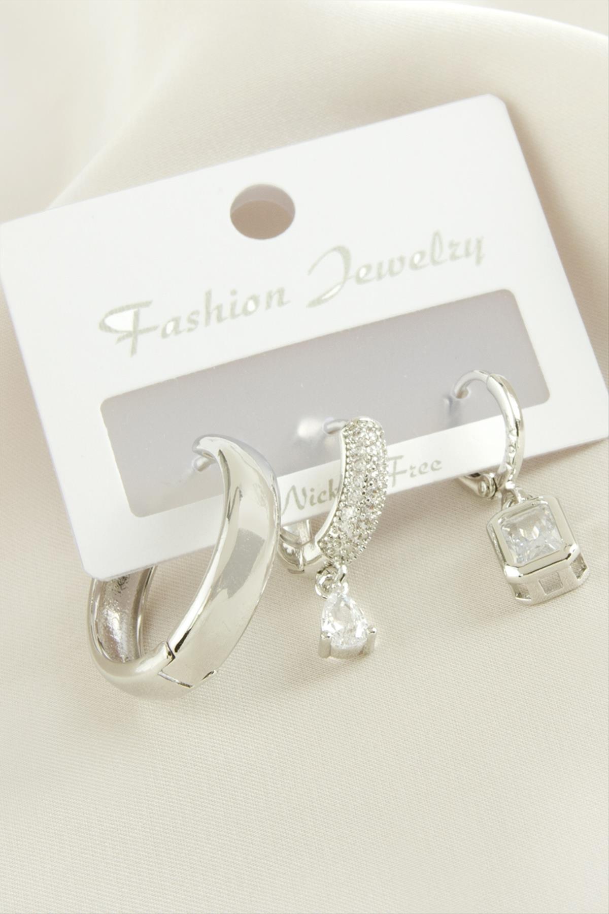 1207381_3-adet-baget-zirkon-tasli-kupe-a174-4.jpg 3 Adet Baget Zirkon Taşlı Küpe-Gümüş Rengi - Görsel 2