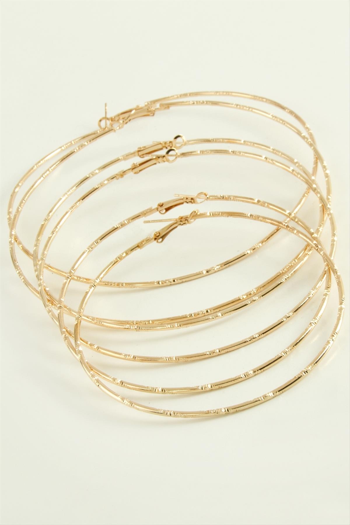 1208424_noktali-metal-halka-kupe-6-adet-6-aff2.jpg Noktalı Metal Halka Küpe 6 Adet-Sarı - Görsel 1