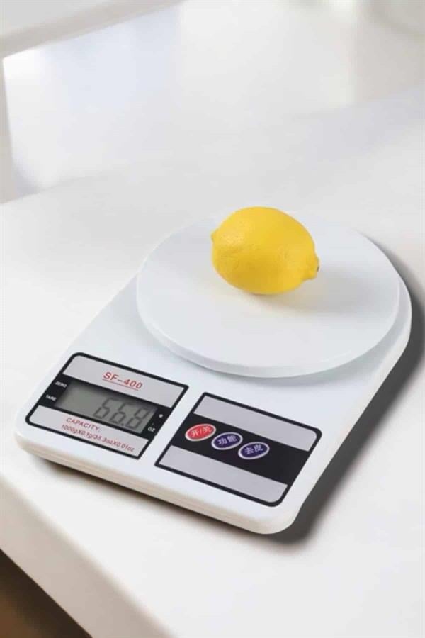 1214077_kompakt-tasarim-ve-tek-tusla-sifirlama-7bb02.jpg Kompakt Tasarım ve Tek Tuşla Sıfırlama Özelliğiyle Kullanımı Kolay Mutfak Tartısı - Görsel 4