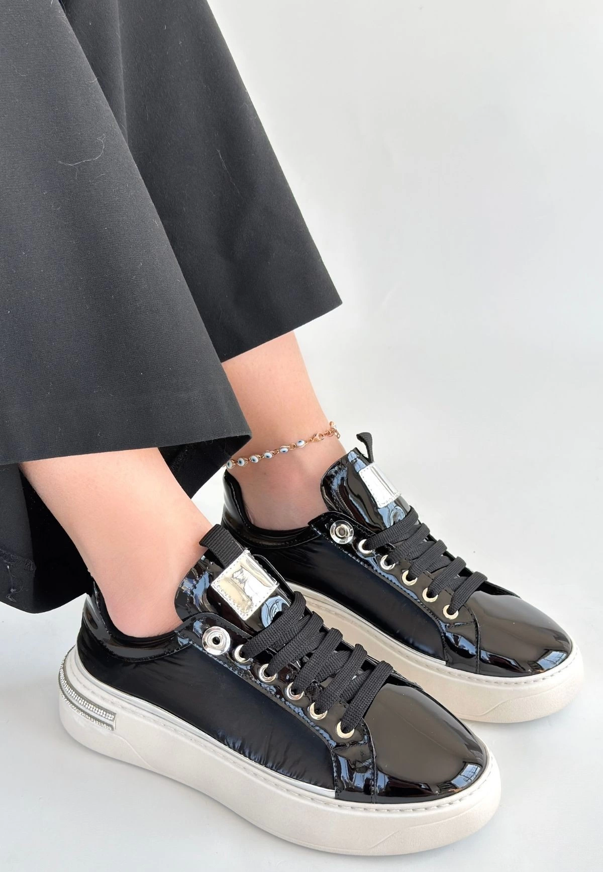 1232122_hley-siyah-rugan-parasut-detayli-bagcikli-spor-ayakkabi-153962180-sw1200sh1736.png Hley Siyah Rugan Paraşüt Detaylı Bağcıklı Spor Ayakkabı (Numara: 39) - Görsel 1